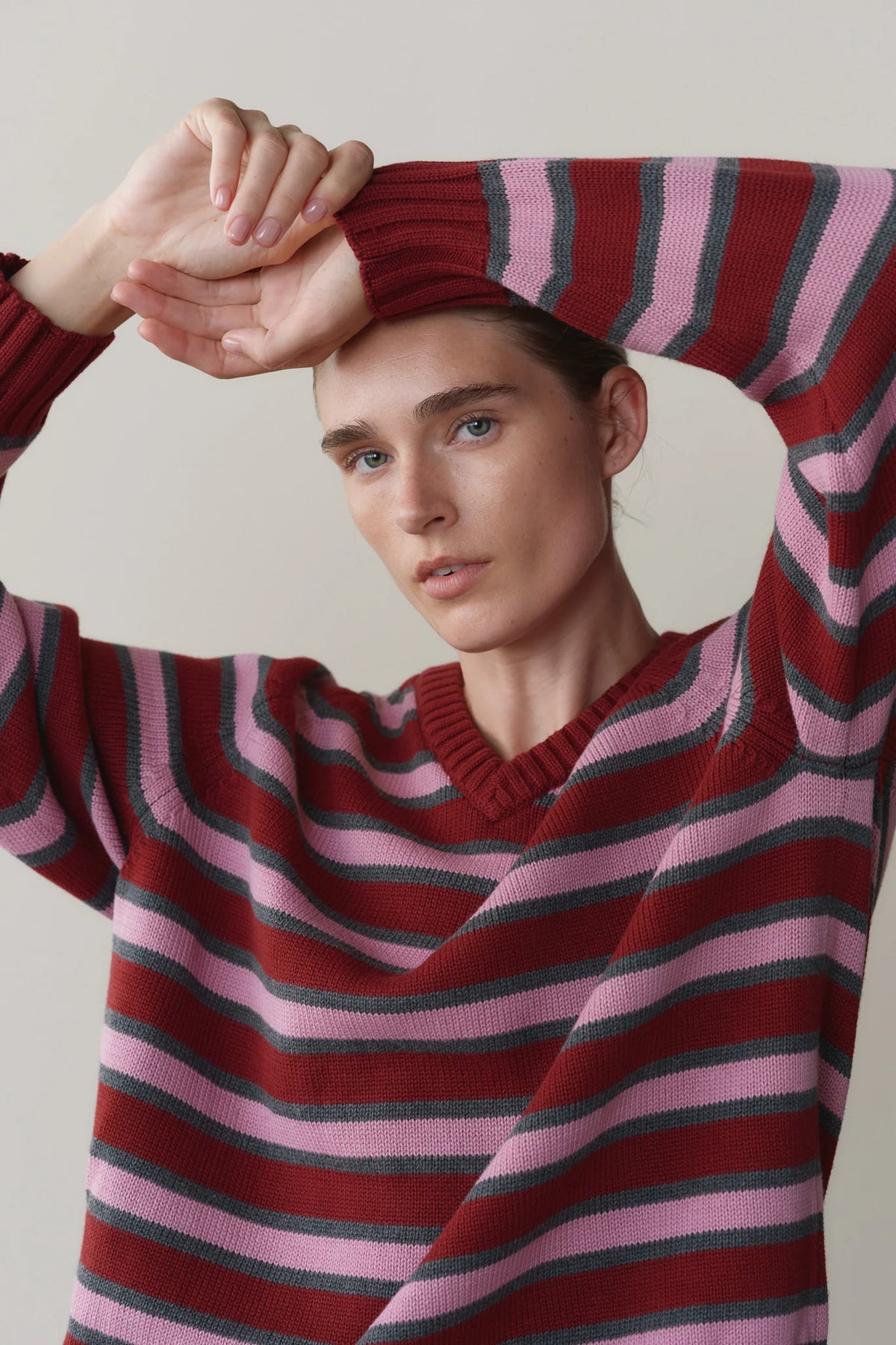 The Cotton Knit Stripe V-Neck Sweater in Oxblood/Roz/Cgy